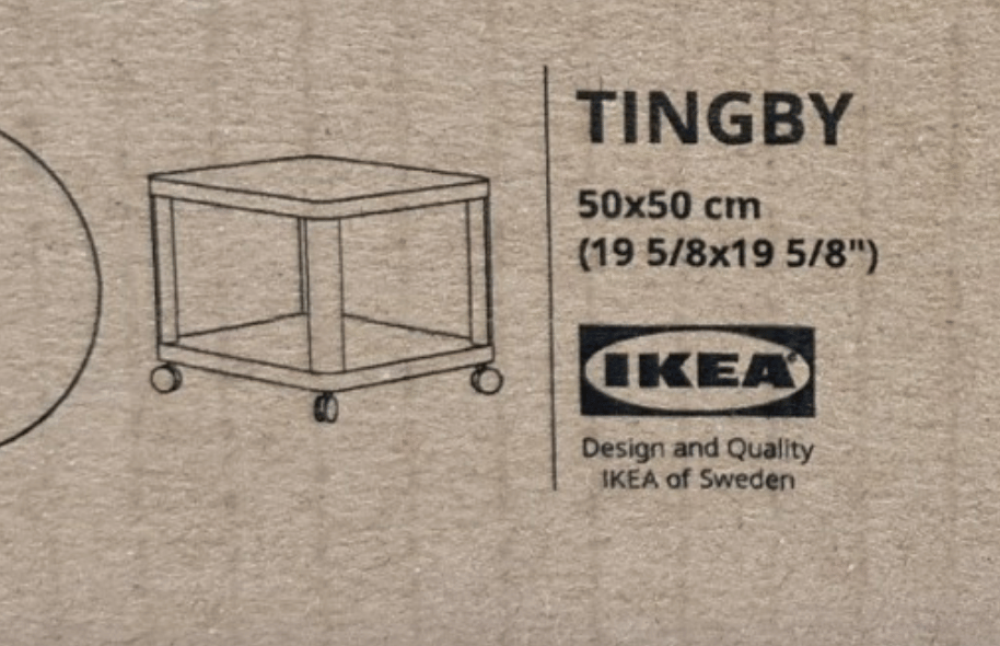 Nadruk grafiki produktu, nazwy TINGBY i logo na kartonowym opakowaniu