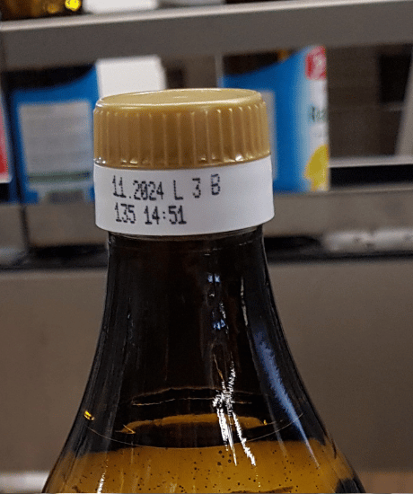 Nadruk daty i danych produkcyjnych na szyjce szklanej butelki